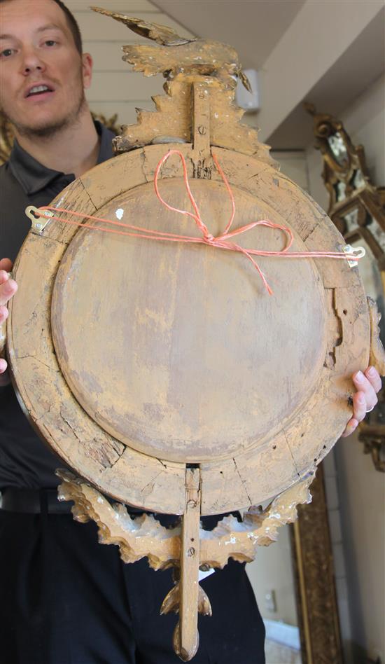 A Regency giltwood and gesso convex wall mirror, H.3ft W.1ft 10in.